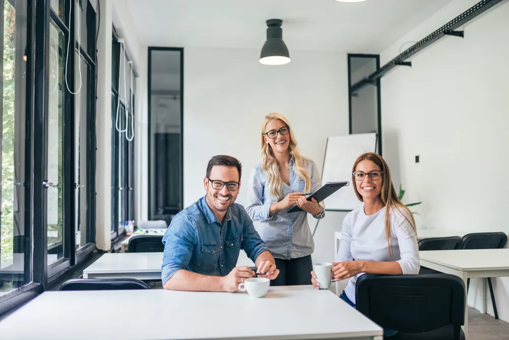 A recruitment team working through a high-volume intake