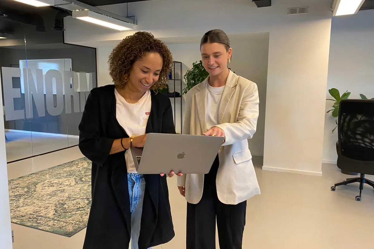 A recruitment marketing team reviewing live campaigns together